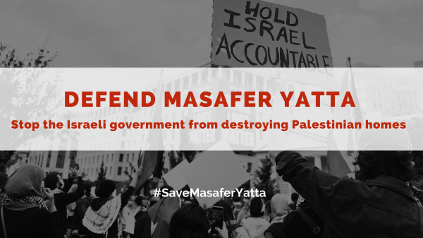 Protest photo reading "Defend Masafer Yatta: Stop the Israeli government from destroying Palestinian homes"